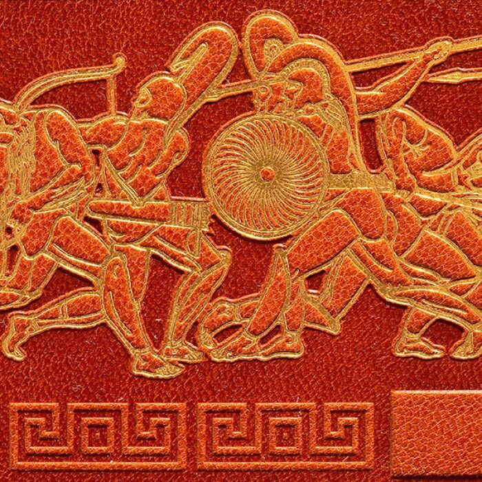 The leather-bound book "Comparative Biographies" by Plutarch