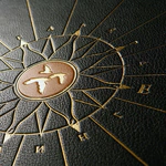 The leather-bound book "Favorites" by R. Kipling