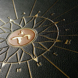 The leather-bound book "Favorites" by R. Kipling