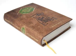 The leather-bound book "The Road of Transformations" by D.Rumi