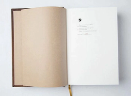 The leather-bound book "The Road of Transformations" by D.Rumi
