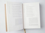 The leather-bound book "The Road of Transformations" by D.Rumi