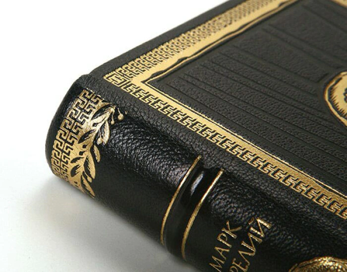 A leather-bound book "Alone with myself. Reflections" by Marcus Aurelius