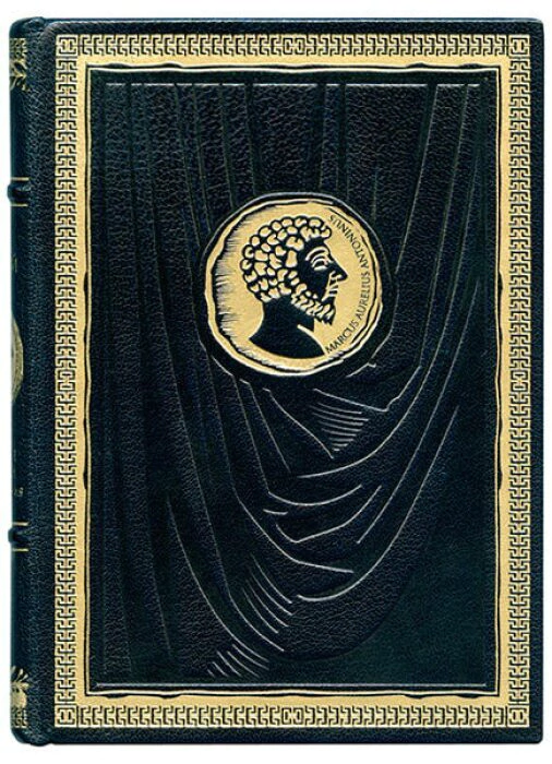 A leather-bound book "Alone with myself. Reflections" by Marcus Aurelius