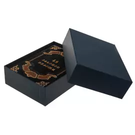 The leather-bound book "48 laws of power"