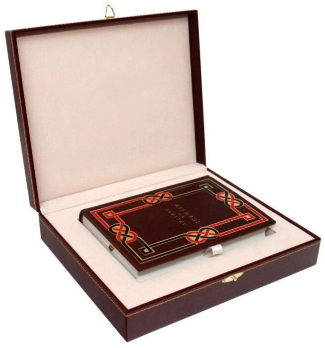 A leather-bound book "For a woman to take note of"