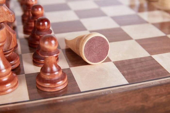 Classic beech chess table with carved stools