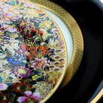 Golden flowers coffee cup and saucer