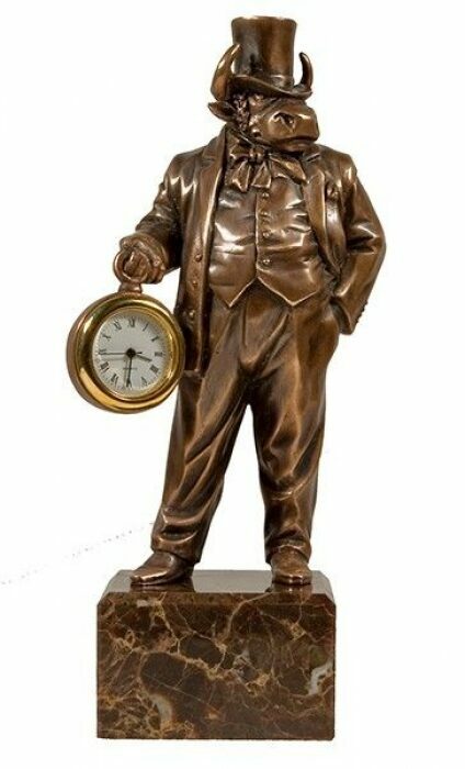 The author's miniature made of bronze "Bull with a clock" with a clock