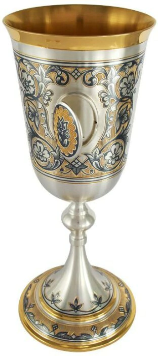Silver cup with a medallion