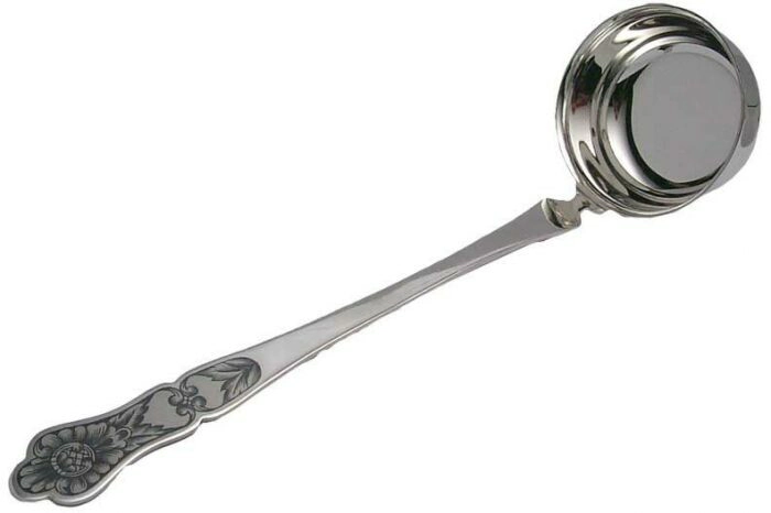 Spoon for pouring soup made of silver