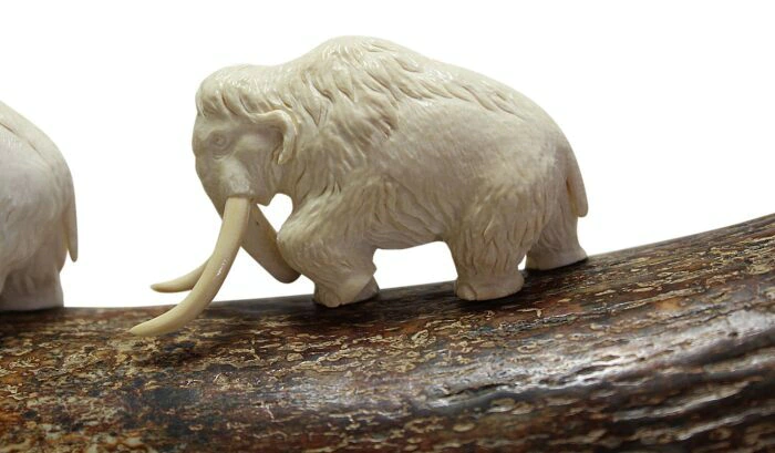 The composition of the mammoth tusk "Three mammoths"