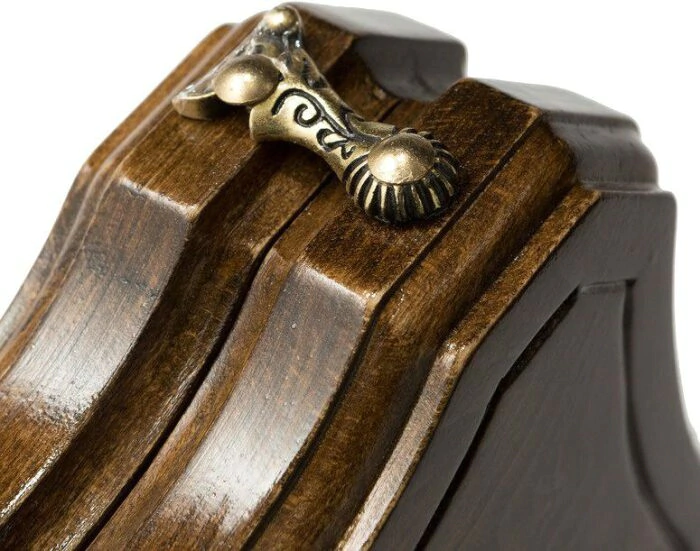 A small carved "Mountain Peaks" game set (chess, backgammon and checkers) with a handle