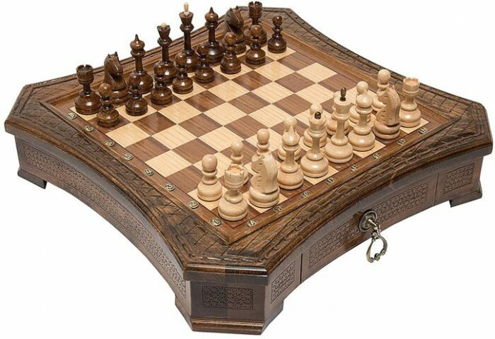 Carved chess set in the Octagon casket with drawers