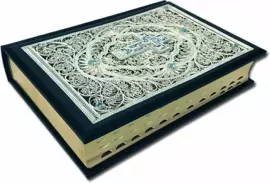 The Bible is large with casting and filigree (silver)