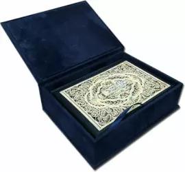 The Bible is large with casting and filigree (silver)