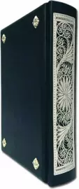 The Bible is large with casting and filigree (silver)