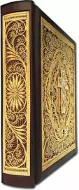 The Bible is large with casting and filigree (gold)