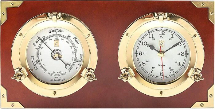 Wall clock with "Sea Wolf" barometer