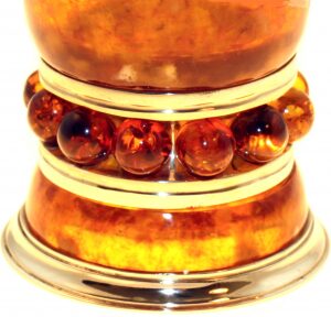 A glass of amber vodka "Grape"