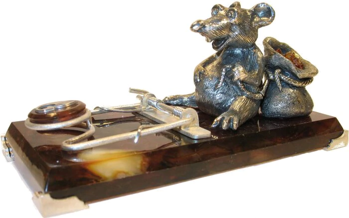 A business card holder made of amber "The Owner"