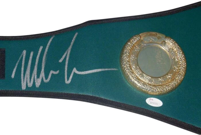 Replica of the world champion belt autographed by boxer Mike Tyson