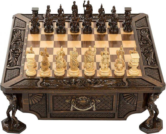 Carved chess set in a casket "On the shoulders of Atlanteans"