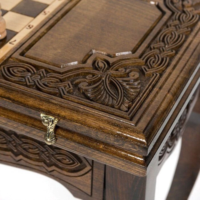 A chess table made of beech "Patterned" carved, with chess and backgammon