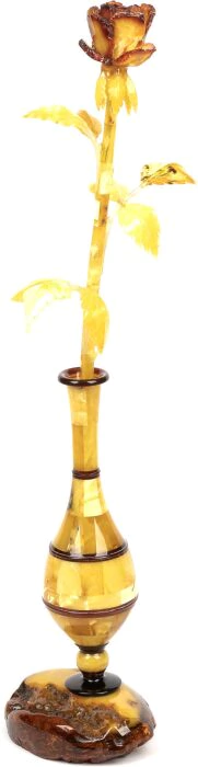 An amber rose in a vase