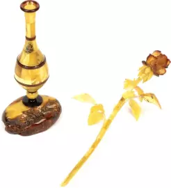 An amber rose in a vase