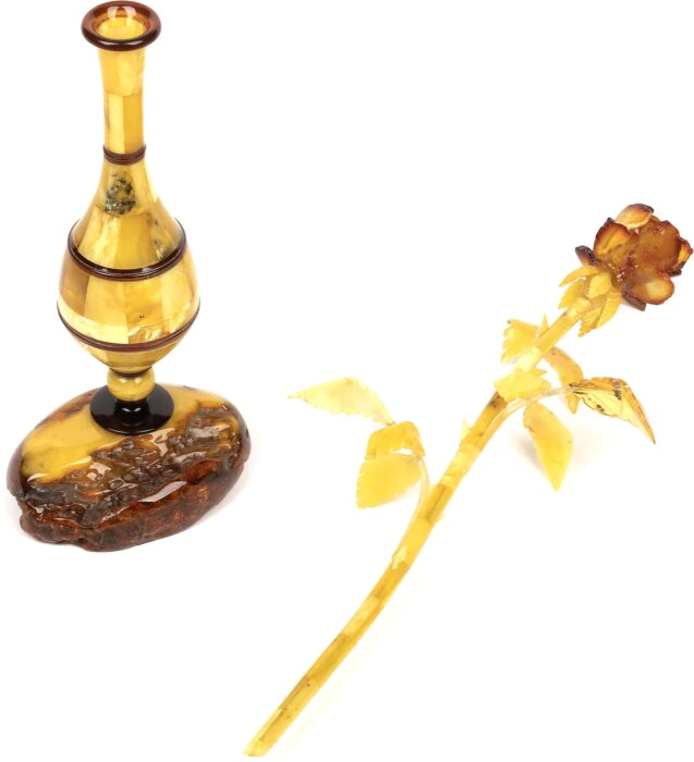 An amber rose in a vase