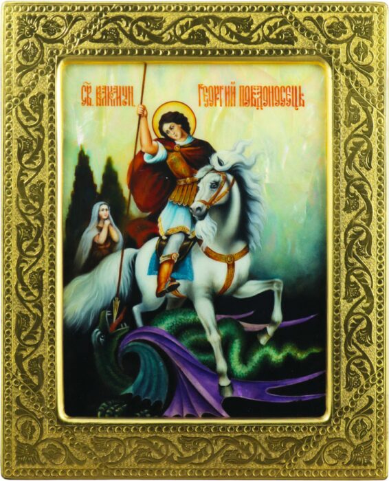 The icon of St. George the Victorious on natural mother-of-pearl in a gold frame