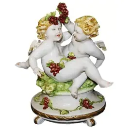 Статуэтка "Ангелочки с виноградом" Фарфор Статуэтка "Ангелочки с виноградом" Фарфор