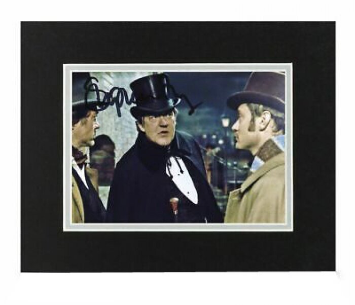 An autographed photo of actor Stephen Fry