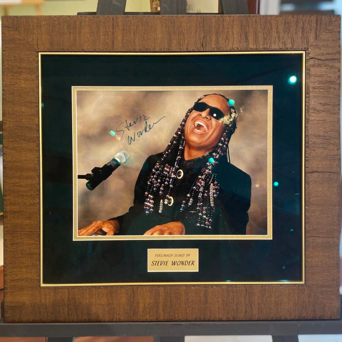 An autographed photo of soul singer Stevie Wonder