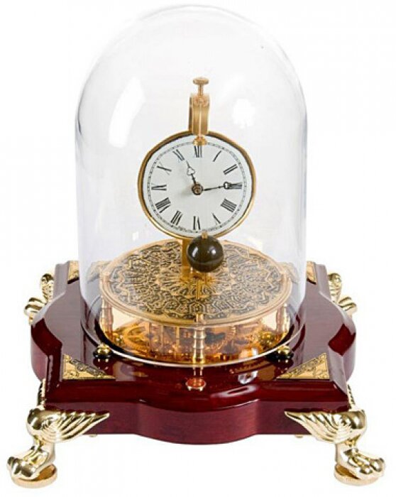 Foucault pendulum clock under a glass case