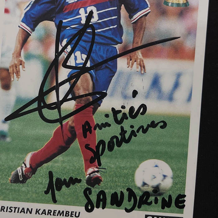 An autographed postcard from football player Christian Karambe