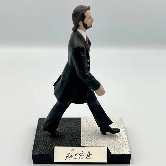 An autographed collectible statuette by musician Ringo Starr