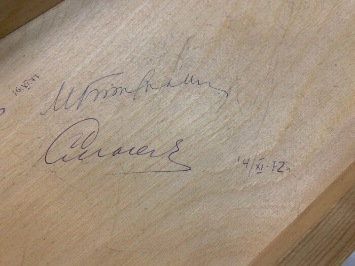 Part of the chessboard with autographs of chess players: Mikhail Botvinnik, Anatoly Karpov, Vasily Smyslov
