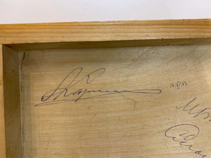 Part of the chessboard with autographs of chess players: Mikhail Botvinnik, Anatoly Karpov, Vasily Smyslov
