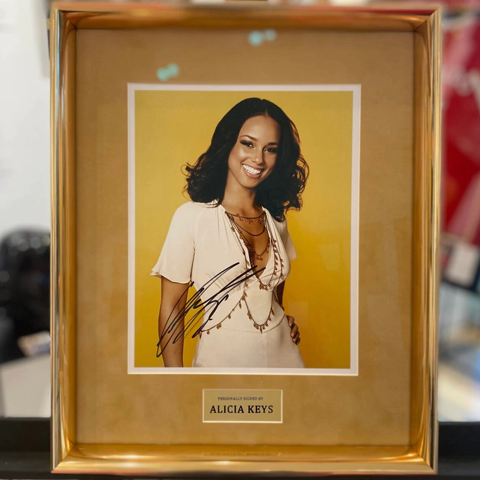 An autographed photo of singer Alisha Keyes