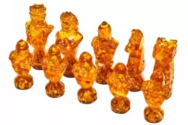 Шахматные фигуры из янтаря средние "Сказочные" для доски 50*50