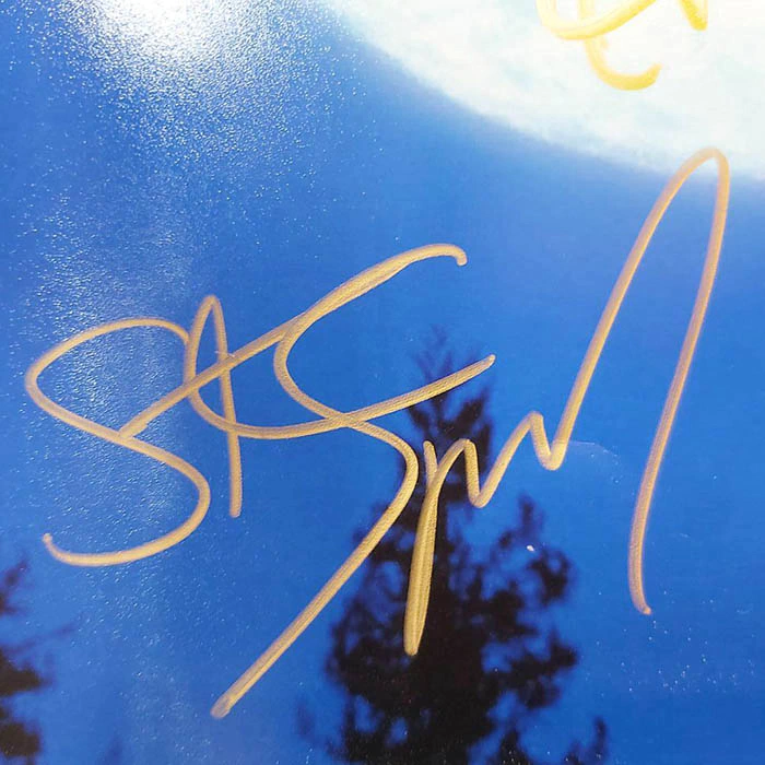 Autographed photo of actors Thomas Henry, Drew Barrymore and film director Steven Spielberg