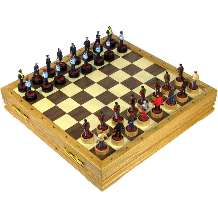 Chess made of oak "Eternal confrontation" with painted tin pieces