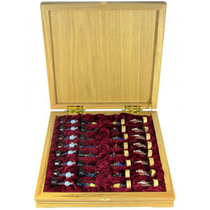 Chess made of oak "Eternal confrontation" with painted tin pieces
