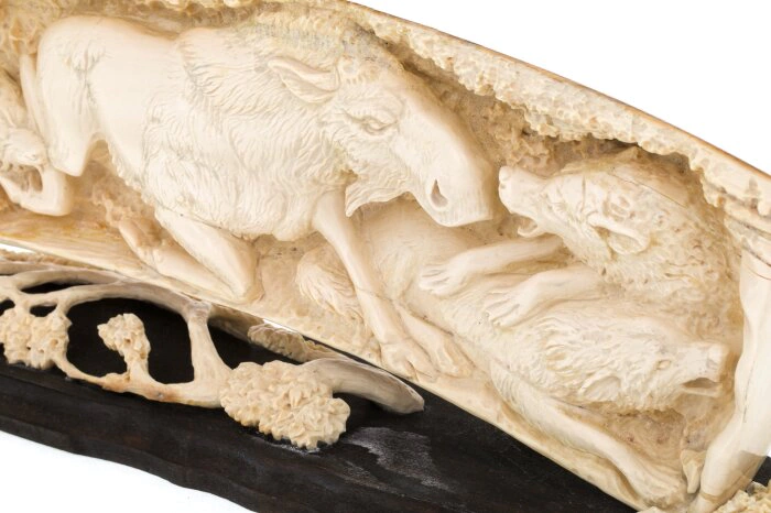 Mammoth tusk sculpture "Hunting of wolves"