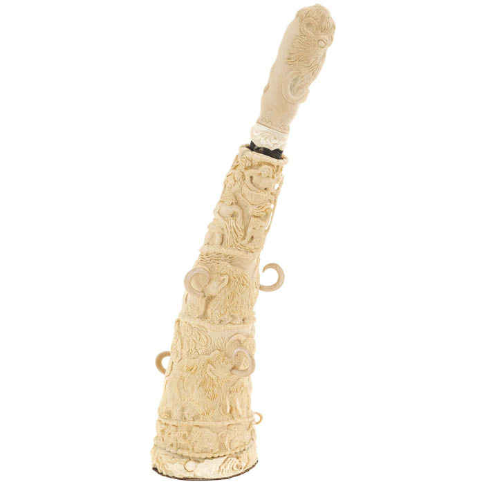 Souvenir of the mammoth tusk "Ice Age" with a knife