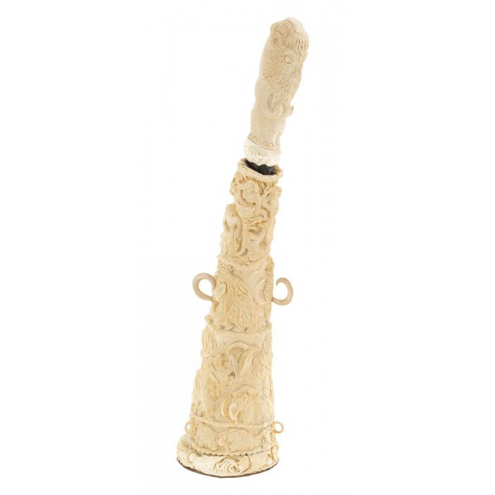 Souvenir of the mammoth tusk "Ice Age" with a knife
