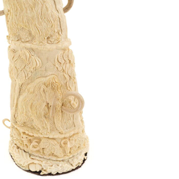 Souvenir of the mammoth tusk "Ice Age" with a knife