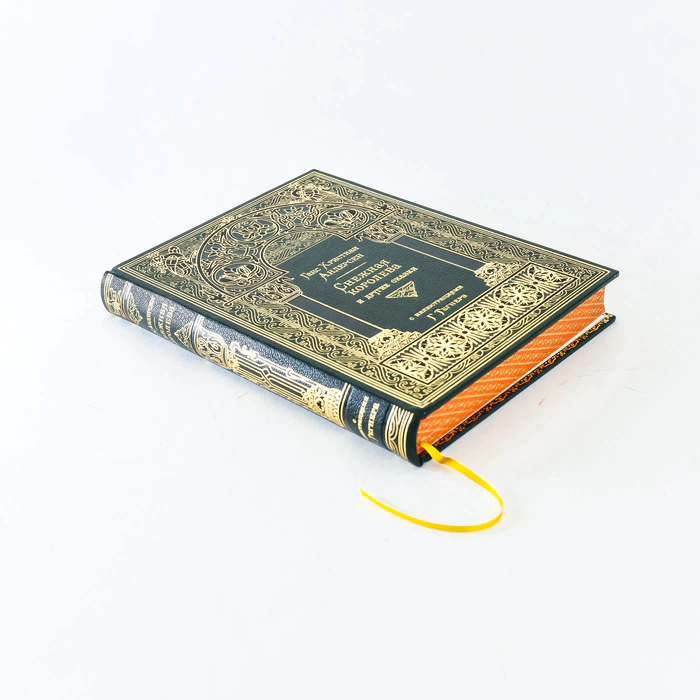 The leather-bound book "Wild Swans and other fairy tales" by G. H. Andersen